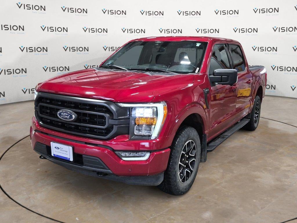 2022 Ford F-150 XLT 4WD SuperCrew 5.5 Box in Rapid Red Metallic Tinted Clearcoat — front three-quarter view